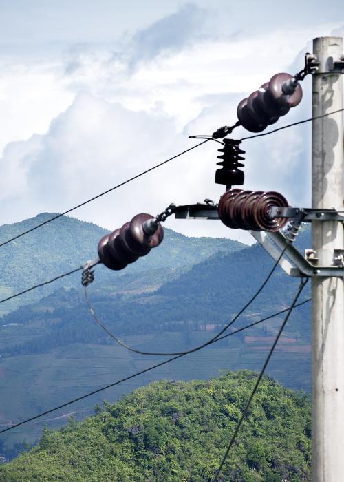 Utility pole supporting electrical wires in Bac Ha, Viet Nam